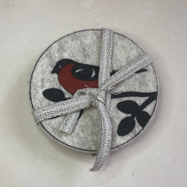 Glassbrikker dompap